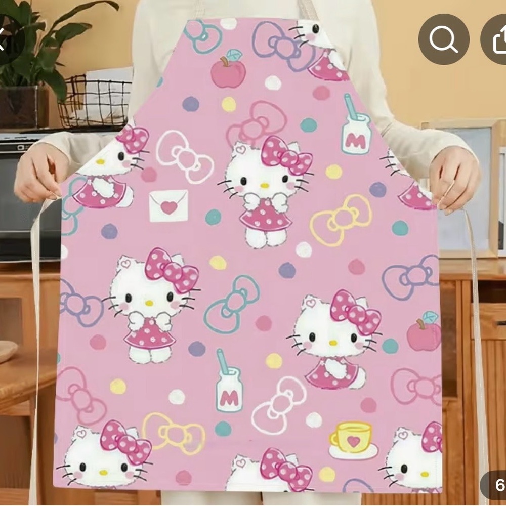 New in package San Rio Hello Kitty Apron FREE HAIR CLIPS